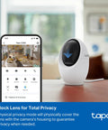 4K Indoor Pan Tilt Security Cam With 360 Degree Coverage AI Motion Tracking Person And Pet Detection Facial Recognition Works As Baby Monitor No Monthly Fees Local Storage Or Optional Cloud Wired Home Surveillance next to smartphone app interface