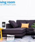 Living room scene featuring Dual USB Wall Outlet With Fast Charge Ports Super Slick Cord Clutter Free Design Rock Solid 15A Receptacle.