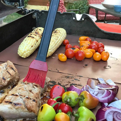 Copper Grill Mats Set Of 5 Nonstick Reusable BBQ Mats For Electric Gas Charcoal Grills Grilling Made Easy With Simple Clean As Seen On TV, meat and vegetables grilling on mat.