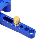 Close-up of Rock Solid Self Centering Doweling Jig 6 Piece Aluminum Alloy Drill Bit Locator with rulers and knobs.