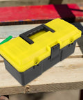 Totally Nifty Portable Plastic Toolbox With Heavy Duty Buckle And Comfy Grip Designed For Mechanics Tool Storage And Everyday Gear Hauling Needs Easy To Use on wood surface.