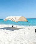Beach setup with Three Pack Beach Shade Accessories Kit With Nylon Ropes And Ratchet Pulleys For Wind Stabilization And Easy Setup