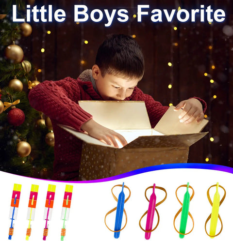 Child opening gift box containing 60 Pack LED Arrow Helicopter Slingshot Toys for Kids, Electric LED Flying Copters.