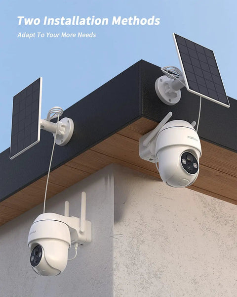 Two solar panels with 4MP Solar Wireless Security Camera System Kit With 4 Cameras, 360 Degree Pan Tilt on a rooftop corner