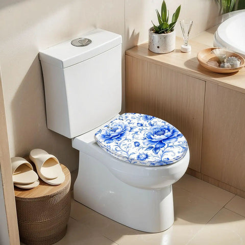 Elongated Blue Peony Floral Chinoiserie Elegant Porcelain Toilet Seat on a white toilet, featuring a soft-close hinge.
