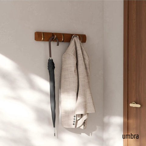 Flip Wall Mounted Coat Rack With Retractable Hooks Do-It-All Modern Space Saving Hallway Organizer in use with coat and umbrella