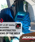 Welder using Featherweight Auto Darkening Welding Helmet With HLX Shell Design, showcasing clear view and comfort, ANSI Z87.1 certified.