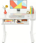 Glass Standing Desk With Drawer 37 X 22 Inches Adjustable Height With Four Preset Levels One Piece Tempered Glass Top White Ergonomic Home Office Desk For Standing Work, shown with open drawer and office items.