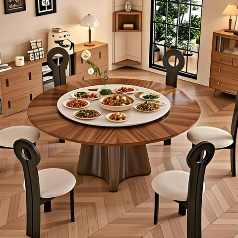 Top Tier Sintered Stone Lazy Susan Turntable Featuring A Smooth Operator 360 Degree Quiet Spin For Effortless Serving on a dining table with dishes.