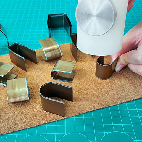 Leather Corner Punch Set With 18 Pieces In 6 Sizes And 3 Shapes, Pro Grade High Carbon Steel Corner Cutters in use on leather mat