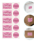 600 Piece Fragile Stickers For Shipping And Moving Adhesive Red Warning Labels With Clear Bold Text Perfect For Glassware Warehouses And Moving Supplies Bulk Pack For Easy Handling And Storage Caution Tags, shown on boxes