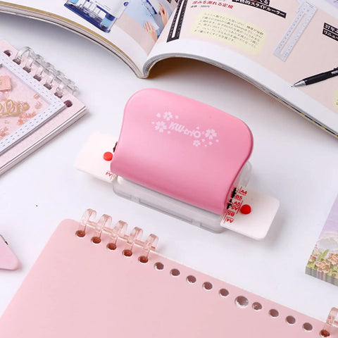 Adjustable 6 Hole Punch for diary planner and binder pages, 5.5mm round holes, shown with pink design, ideal for A5 A6 A7 paper