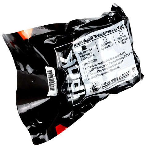 Front view of IPOK first aid kit in black sealed pouch; label lists gauze and CAT tourniquet.