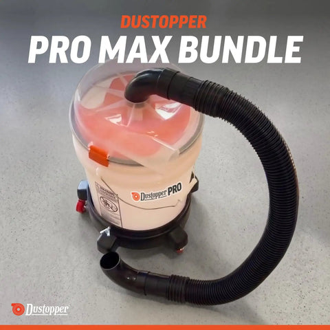Premium Cyclone Dust Collector Kit With Reinforced Five Gallon Bucket And Rock Solid Rolling Dolly For Shop Vacs on work surface with hose.