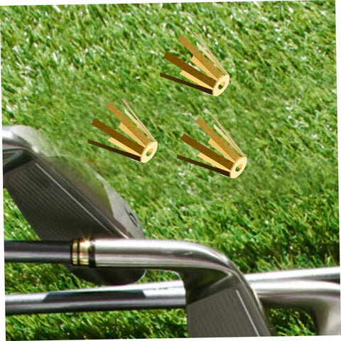 Straight Up Solid Universal Brass Golf Shaft Shim Set Five Piece Kit shown with golf club and brass shims on grass.