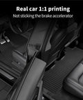 Top Shelf TPE Floor Mats For Tesla Model Y 2025 with real car 1:1 fit, non-slip grip, showing front and rear liners in black.