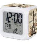 Smooth Operator Led Digital Alarm Clock Featuring Real Time And Room Temp Display, Parisian Crown Cube Frame, Silent Non Ticking Mode, Floral Embossed Panel, Comfy Snooze Switch And Gentle Glow Light For Bedroom in white cube design displaying time and temperature.