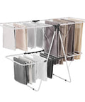 Heavy Duty Two Tier Clothes Drying Rack With 31 Sturdy Rods And Sock Clips Foldable Metal Laundry Stand holding assorted towels.