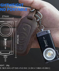 Hand holding G2 Mini LED Flashlight Keychain, 500 Lumens Rechargeable Pocket Light, showing dimensions and lightweight design.