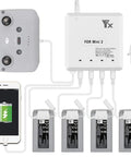 6 In 1 Battery Charger For DJI Mini 4K Mini 2 Mini SE Mini 2 SE Drones Rapid Parallel Charging Hub Powers Four Batteries And Remote Control Station For Quick Power Up Not For Mavic Mini Gen 1, showing charger connected to four batteries and remote control.