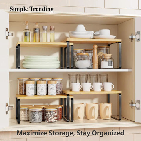 Premium Bamboo Kitchen Counter Shelf Set Of Two Stackable Expandable Spice Rack Storage Holder For Jars Cookbooks Tools in a cabinet.