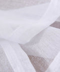 Close-up of White Sheer Curtains 63 Inch Length Rod Pocket Voile Drapes For Living Room And Bedroom Set Of 2 with semi crinkle texture