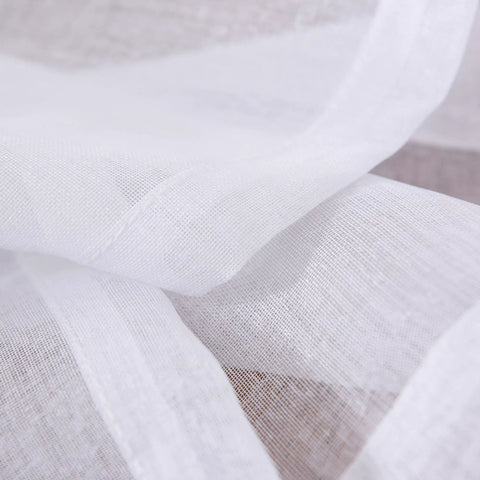 Close-up of White Sheer Curtains 63 Inch Length Rod Pocket Voile Drapes For Living Room And Bedroom Set Of 2 with semi crinkle texture