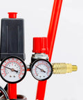 Eight Piece One Quarter Inch NPT Quick Connect Air Hose Fittings Kit with Universal Couplers attached to pressure gauges
