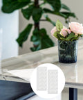 24 Pack Clear Self Adhesive Rubber Feet For Glass Tables And Drawers Rock Solid Anti Slip Bumpers on a polished table.