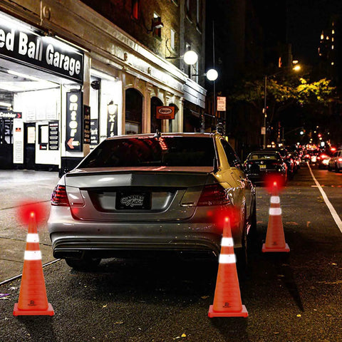 28 Inch Collapsible Traffic Cones Two Pack With LED Lights And Reflective Collar near parked car at night