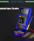0.01mm Insulated Jump Wire For Motherboard Fingerprint Sensor Repair with digital multimeter and probes on black surface
