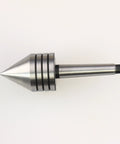Live tailstock center for wood lathe with 60-degree point and #1MT shank; metal silver with black grooved collars.