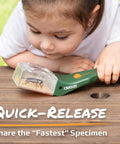5x Magnifying Bug Catcher With One-Handed Quick Release Trap For Indoor Outdoor Exploration Kids And Adults STEM Learning Toy For Safe Bug Viewing And Easy Release, child using green plastic trap