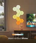 Hexagon Shapes Expansion Pack mounted on wall for ambient lighting next to TV in a living room.
