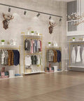 Hella Sturdy Two Tier Industrial Garment Rack With Thick Wood Shelf And Durable Metal Frame Wall Mounted showcasing clothes storage in an elegant boutique.