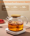 Smart Desk Electric Coffee Mug Warmer With Three Adjustable Heat Settings And Twelve Hour Auto Shut Off, glass kettle on warmer.