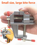 Compact Table Vise For DIY Projects And Crafting, Portable Bench Vise With Swivel Base, held in hand, demonstrating size.
