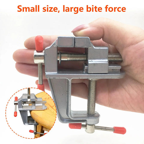 Compact Table Vise For DIY Projects And Crafting, Portable Bench Vise With Swivel Base, held in hand, demonstrating size.
