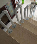 Heavy Duty Wrought Iron Staircase Handrail U Shaped Non Slip Safety Rail Built Tough For Indoor Or Outdoor Rooms Holds Four Forty Pounds Like An Absolute Champ with white finish on wooden stairs.