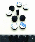 One Half Inch Round Silicone Rubber Bumper Feet Three Sixteenths Of An Inch Thick Adhesive Backed Spacer Pads For Electronics Furniture And Appliances Non Slip Waterproof Protectors 24 Pack showing adhesive side up and down with ruler.