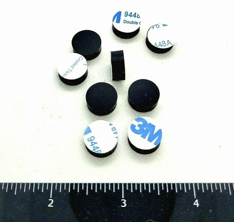 One Half Inch Round Silicone Rubber Bumper Feet Three Sixteenths Of An Inch Thick Adhesive Backed Spacer Pads For Electronics Furniture And Appliances Non Slip Waterproof Protectors 24 Pack showing adhesive side up and down with ruler.