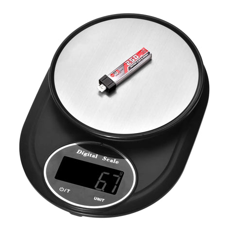 6 Pack 250mAh 1S LiPo Battery 3.8V LiHV 30C To 60C With JST PH Connector on digital scale weighing 6.7g, for FPV drones.