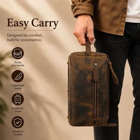 Premium Travel Wash Bag For Men And Women Rock Solid Buffalo Leather Shaving Kit Pouch held by a person, showcasing side handle and zipper.