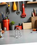 Screw Mount Fire Sprinkler Head Guard Protective Steel Cage Shields Irrigation Pipes Against Impact And Vandalism Real Deal Protection For Backyards Workshops Built Tough Fits Standard Heads Size 3 14 By 2 36 Inches Matte Black on a workbench with tools.