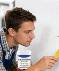 Man using All In One Wall Repair Kit With Easy To Use Putty 500G Quick Drying Filler for cracks in walls