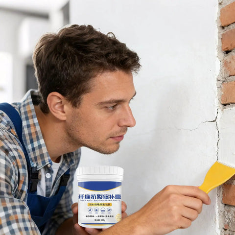 Man using All In One Wall Repair Kit With Easy To Use Putty 500G Quick Drying Filler for cracks in walls