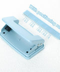 Two Hole Paper Punch Metal Blue Desktop Puncher for File Folders And Loose Leaf Books with positioning ruler for A4 A5 B5 formats.