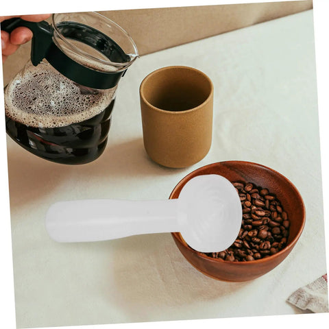 Plastic Espresso Tamper For Home And Commercial Coffee Making No Frills Durable Press Tool near coffee beans