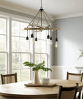 Farmhouse Style 6 Light Rope Pendant Chandelier In Smoked Birch And Textured Black Finish above dining table.