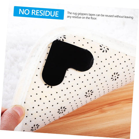 4 Pack Heart Shape Non Slip Rug Pads For Hardwood Floors And Tiles, black pad on white dotted rug corner lifted by hand